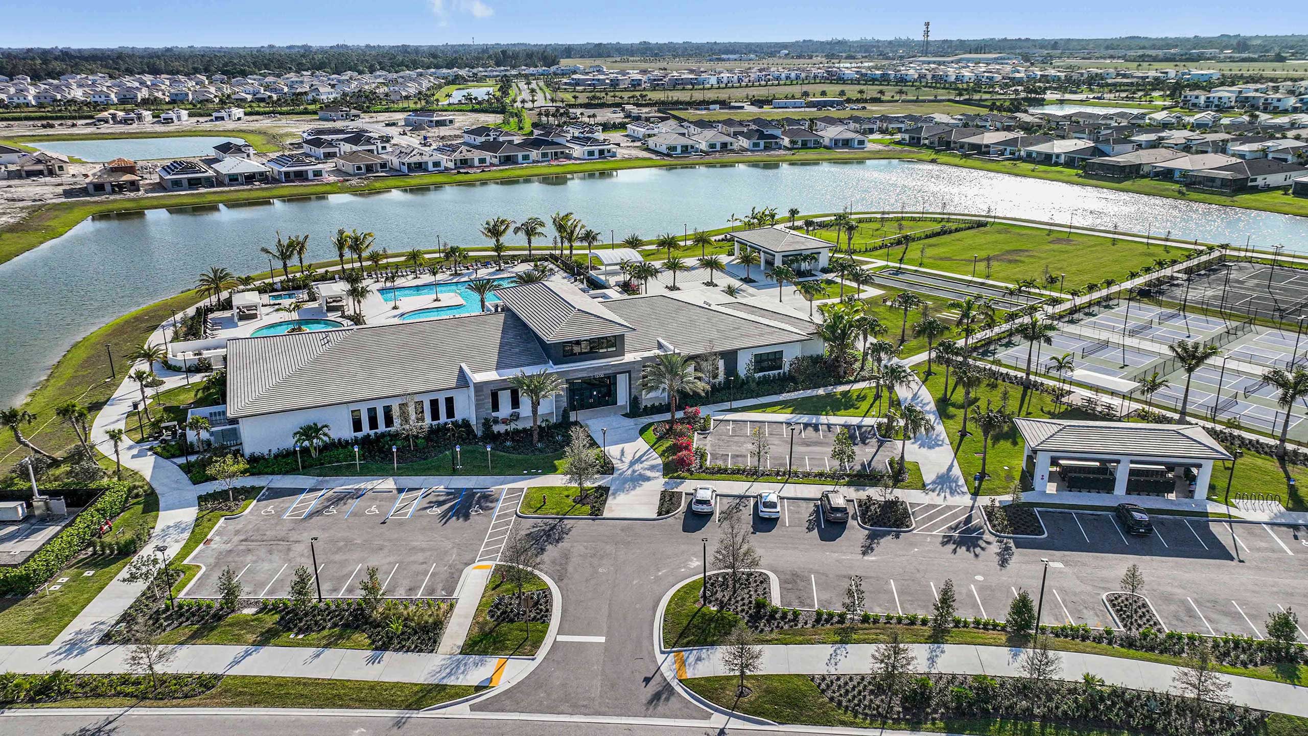 Aerial of Lakefront Clubhouse and Sports Courts