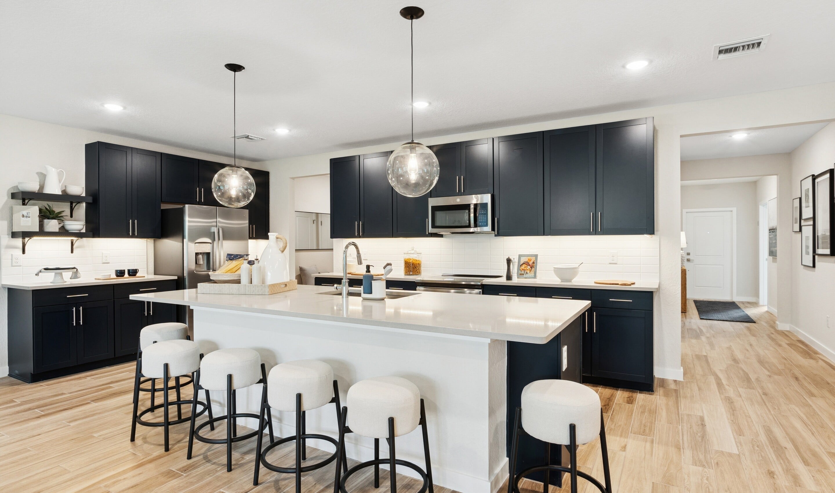 Aegean - Kitchen with Pendant Lighting and Floating Shelves